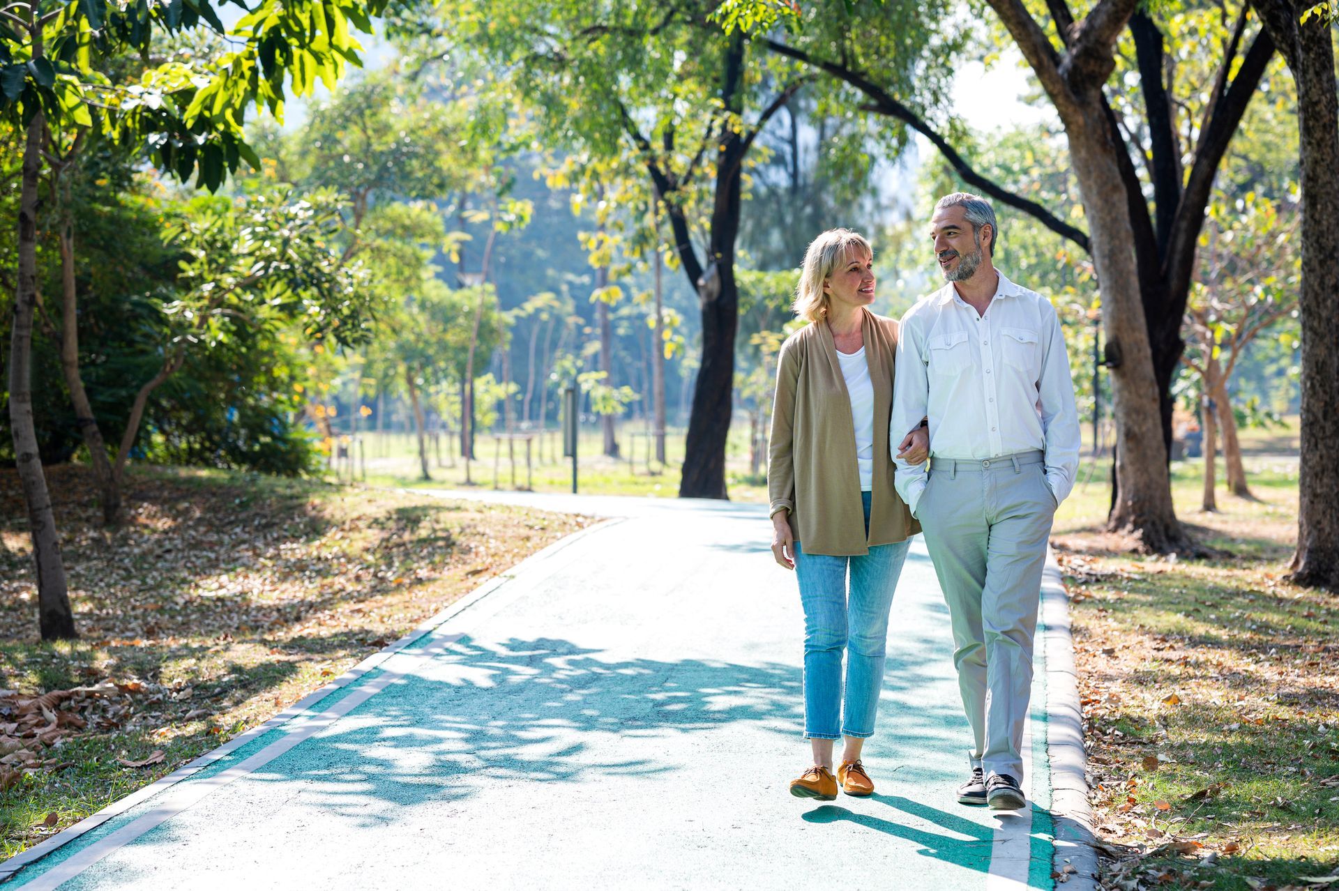 Couple Seniors Walking in the Park - Clearwater, FL - Insurance by Trever