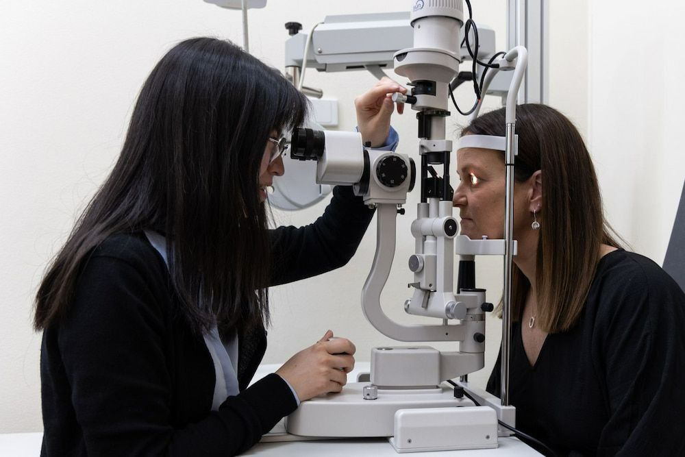 Optometrist Performing Eye Test On Patient — Central Coast Eyecare In Gosford, NSW