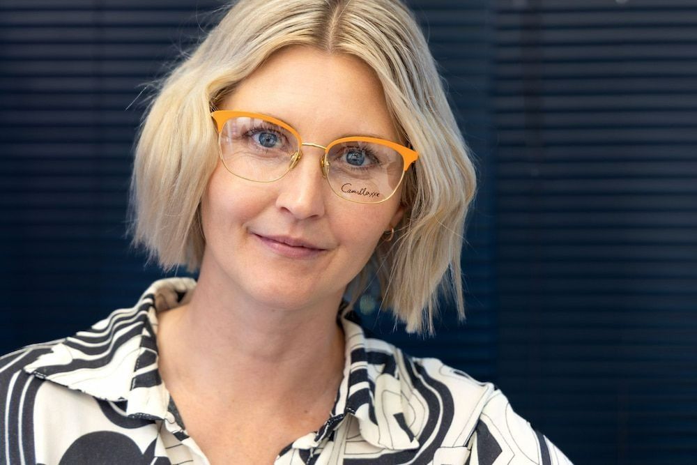 A Woman Wearing Glasses — Central Coast Eyecare In Gosford, NSW