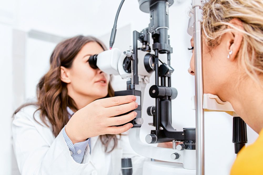 Ophthalmologist Checking The Patient's Eyes — Central Coast Eyecare In Gosford, NSW