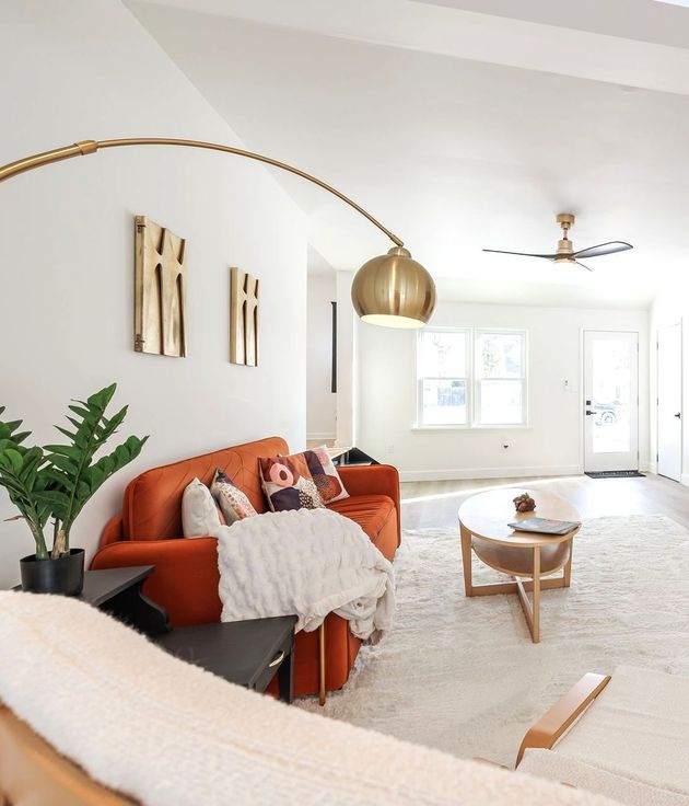 A living room with a couch and a coffee table