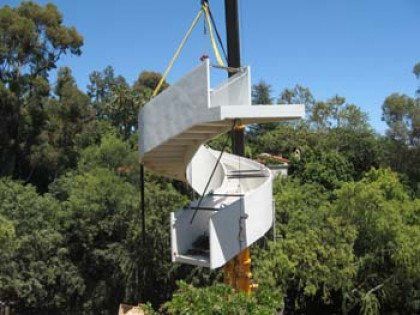 white spiral stairs lifted towards the residential property