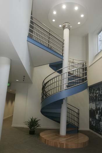 custom spiral stair with steel railing