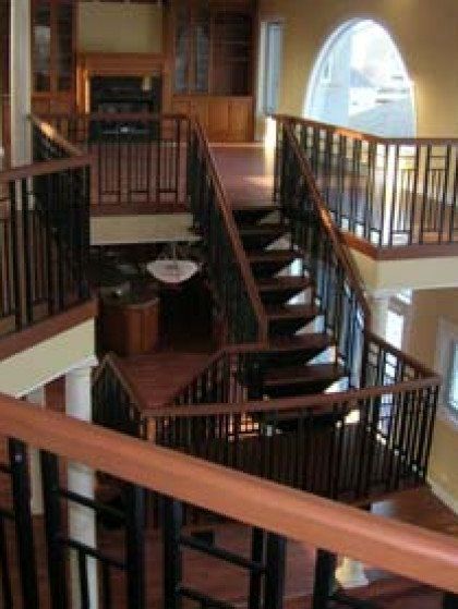 A staircase leading up to the second floor of a house
