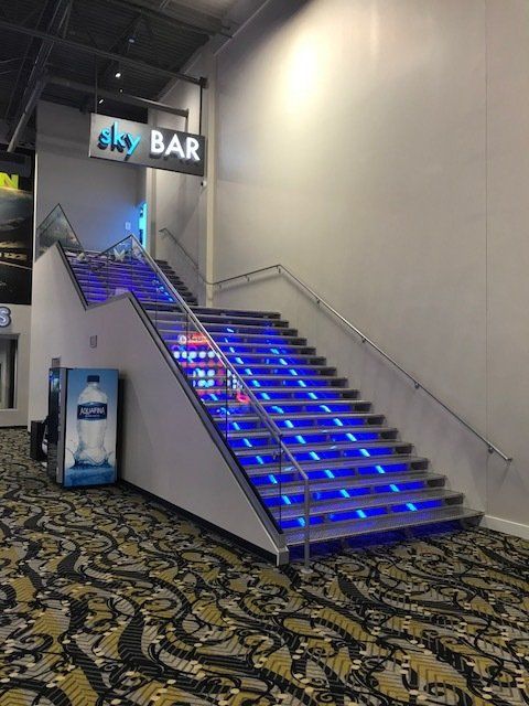 A set of stairs leading up to a sky bar