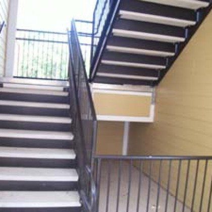 A set of stairs leading up to the second floor of a building.