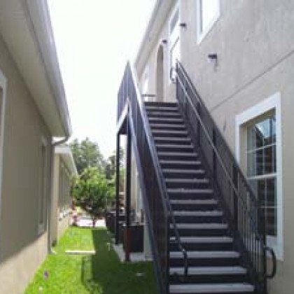A set of stairs leading up to the second floor of a building.