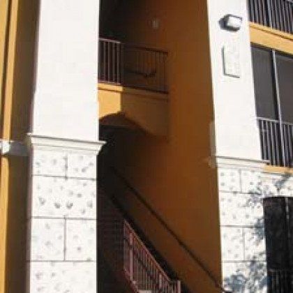 There are stairs leading up to the second floor of a building.