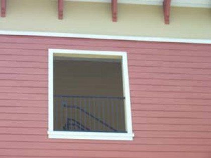 There is a window on the side of a building.