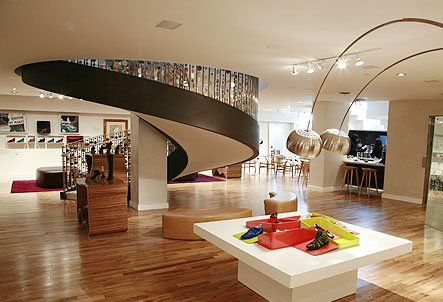There is a spiral staircase in the middle of the room.