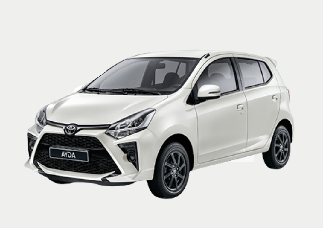 A white toyota agya hatchback is shown on a white background.