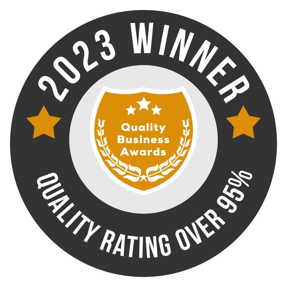 A logo for the 2023 winner of the quality business awards.