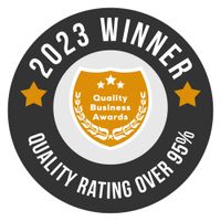 A logo for the 2023 winner of the quality business awards.