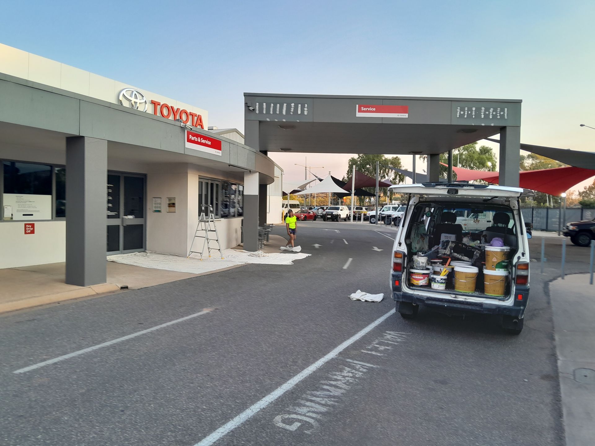 A Toyota Building Being Painted White — Ross Painting In Ciccone, NT