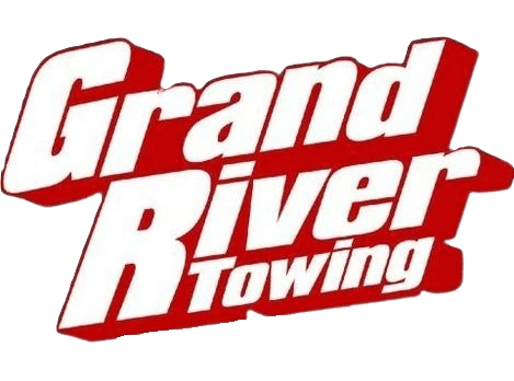 Logo for Grand River Towing in white text with a red drop shadow.