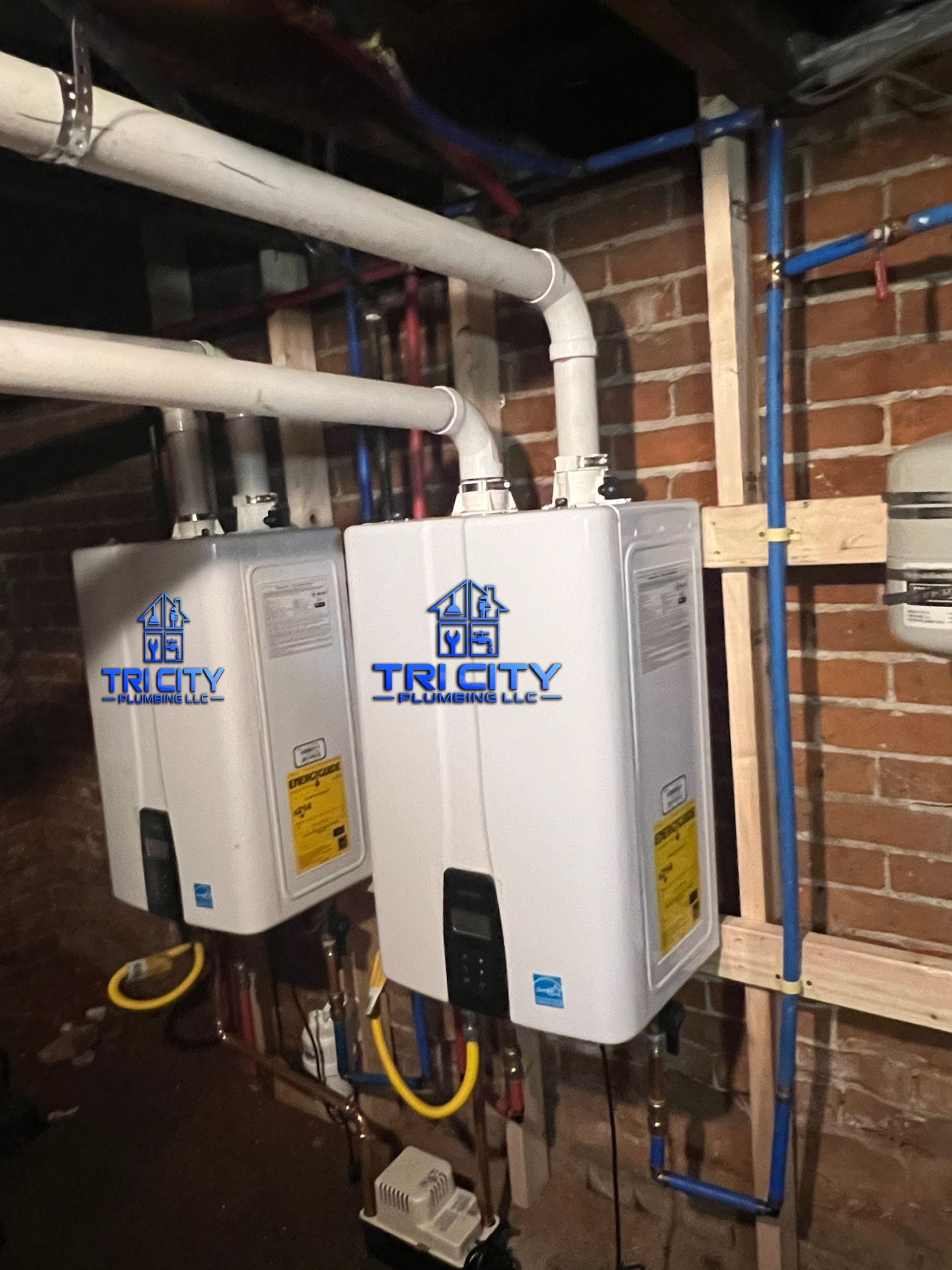 A man is fixing a water heater with a screwdriver.