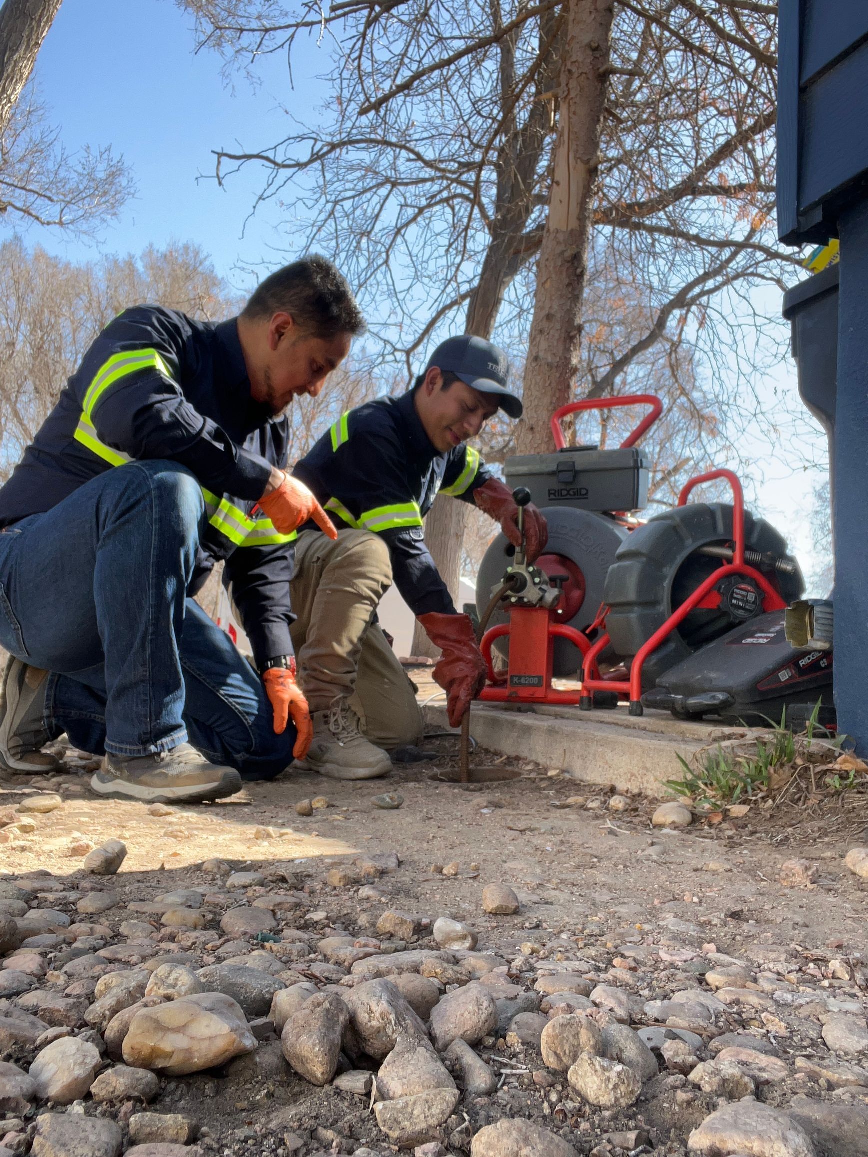 a person is using a tool to remove a drain from a bathtub