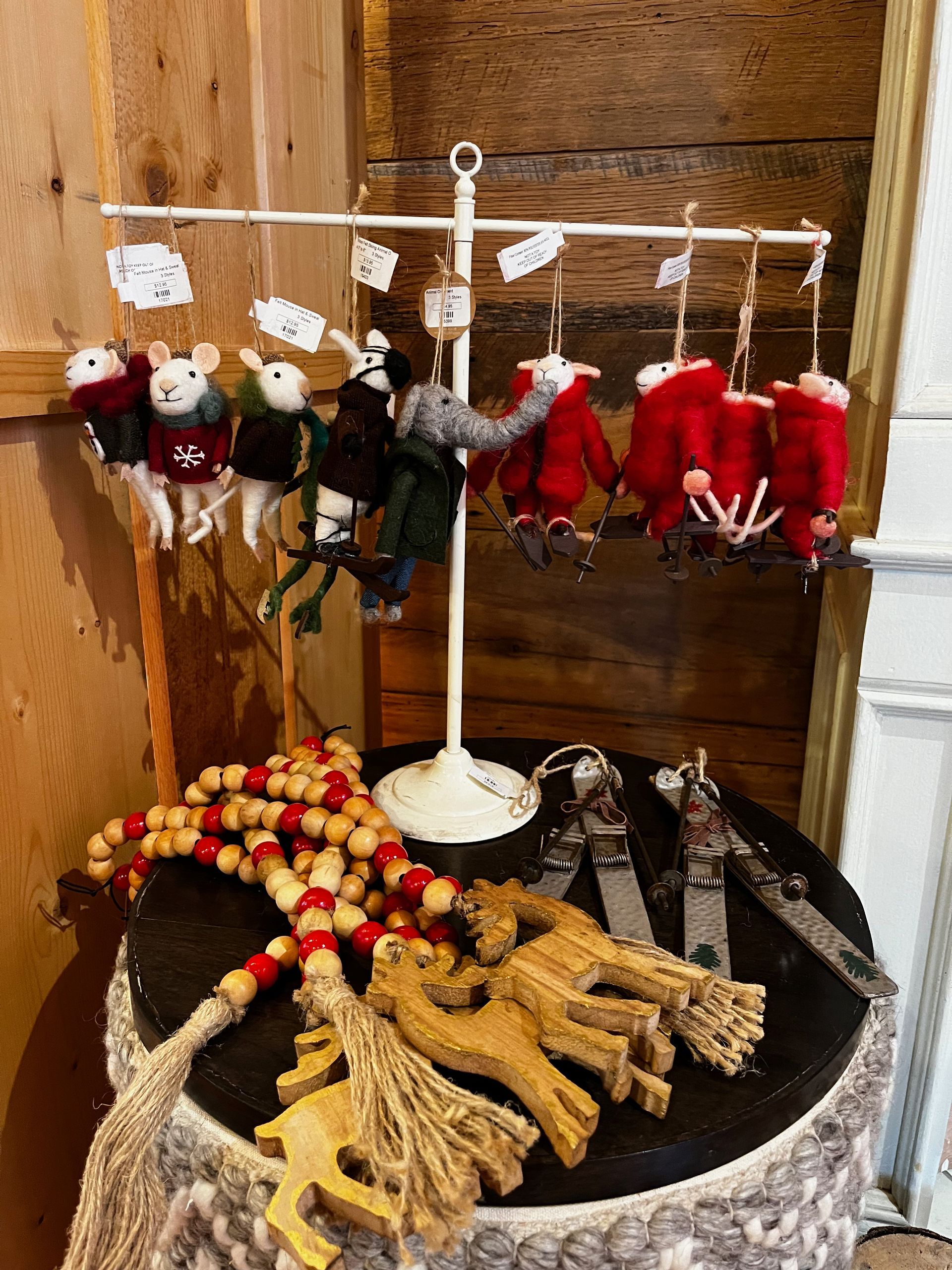 A table with a bunch of christmas decorations on it.