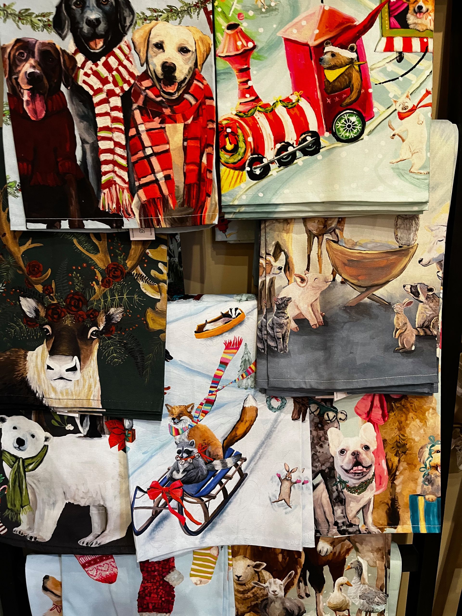 A bunch of christmas cards with dogs on them