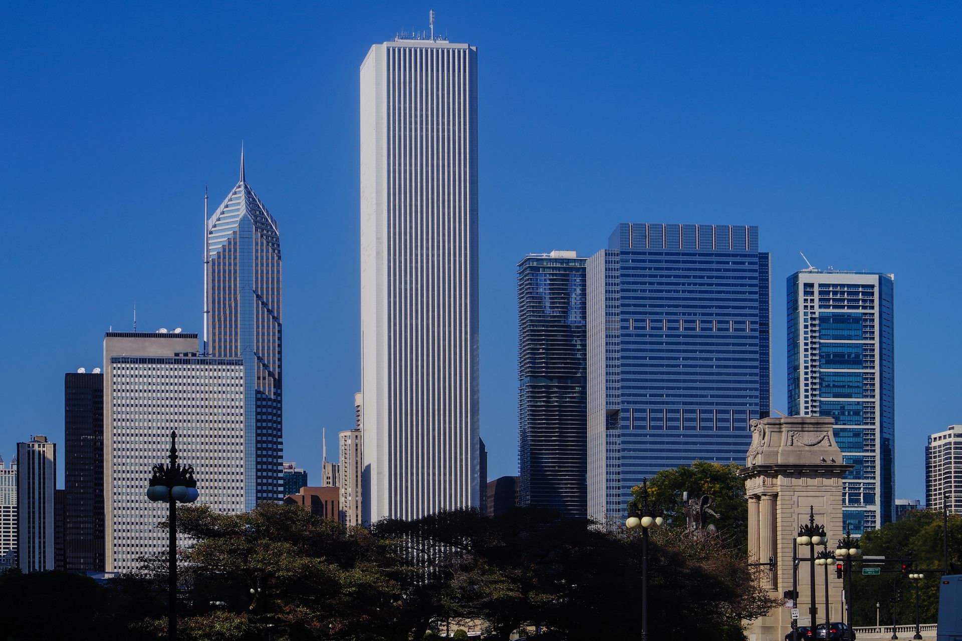Chicago skyline against a bright blue sky