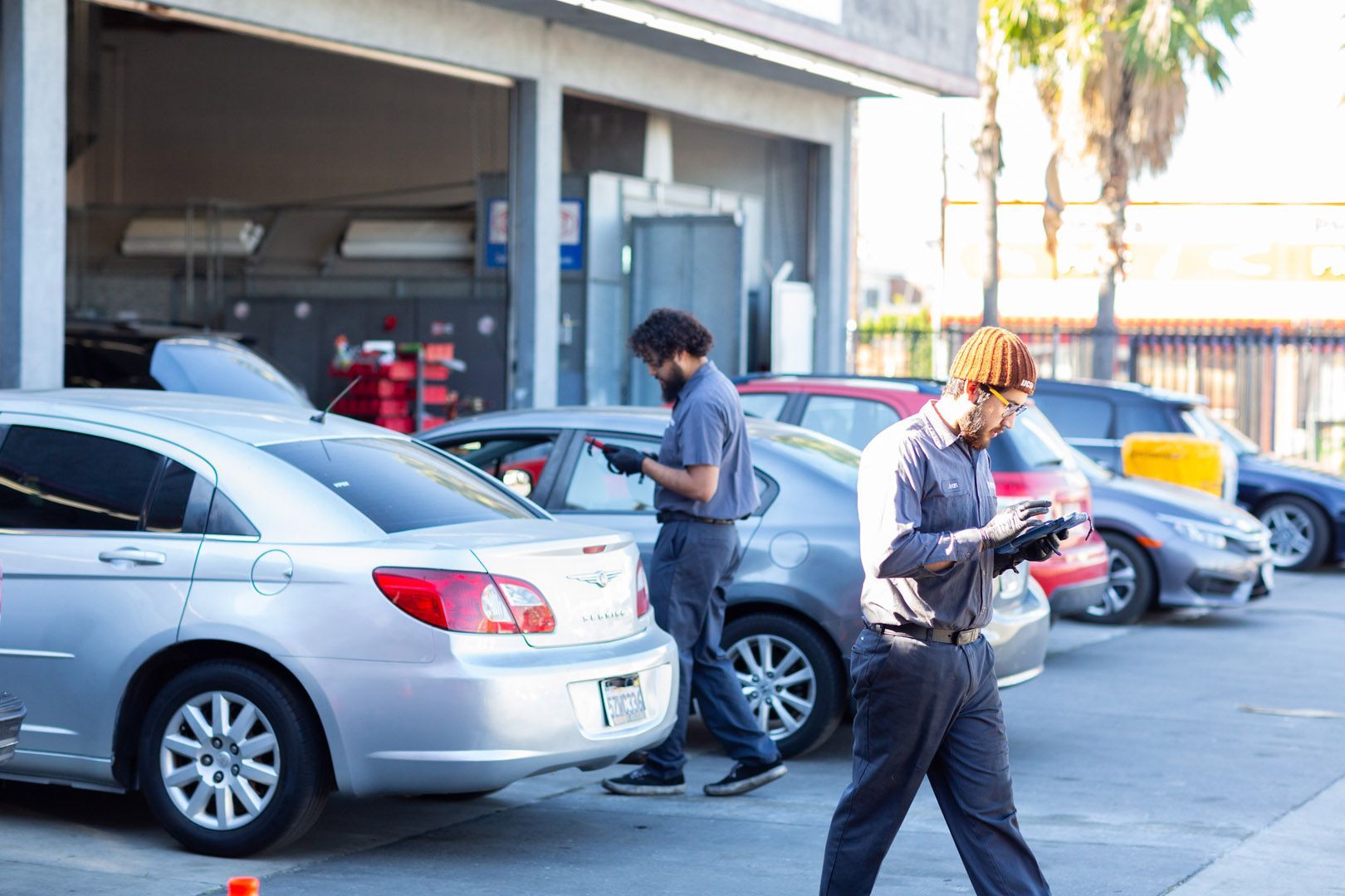 Mechanics Working at an Auto Repair | University Tire & Auto Service