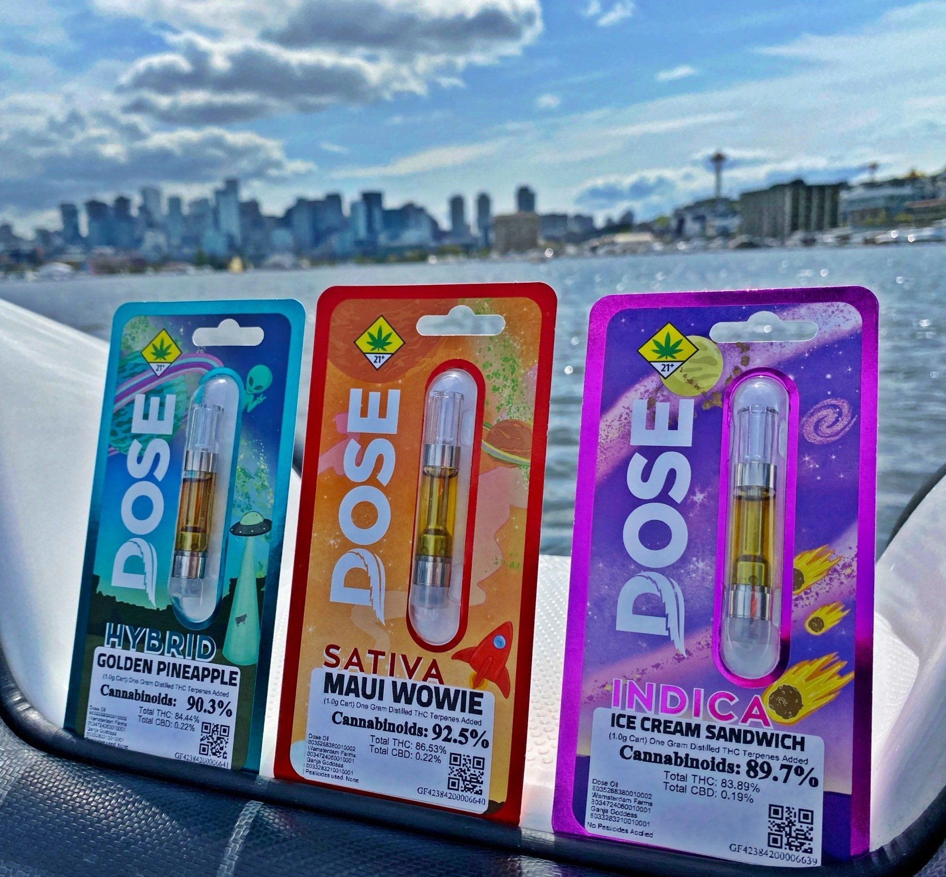 Three different flavors of dose cartridges are sitting on a boat