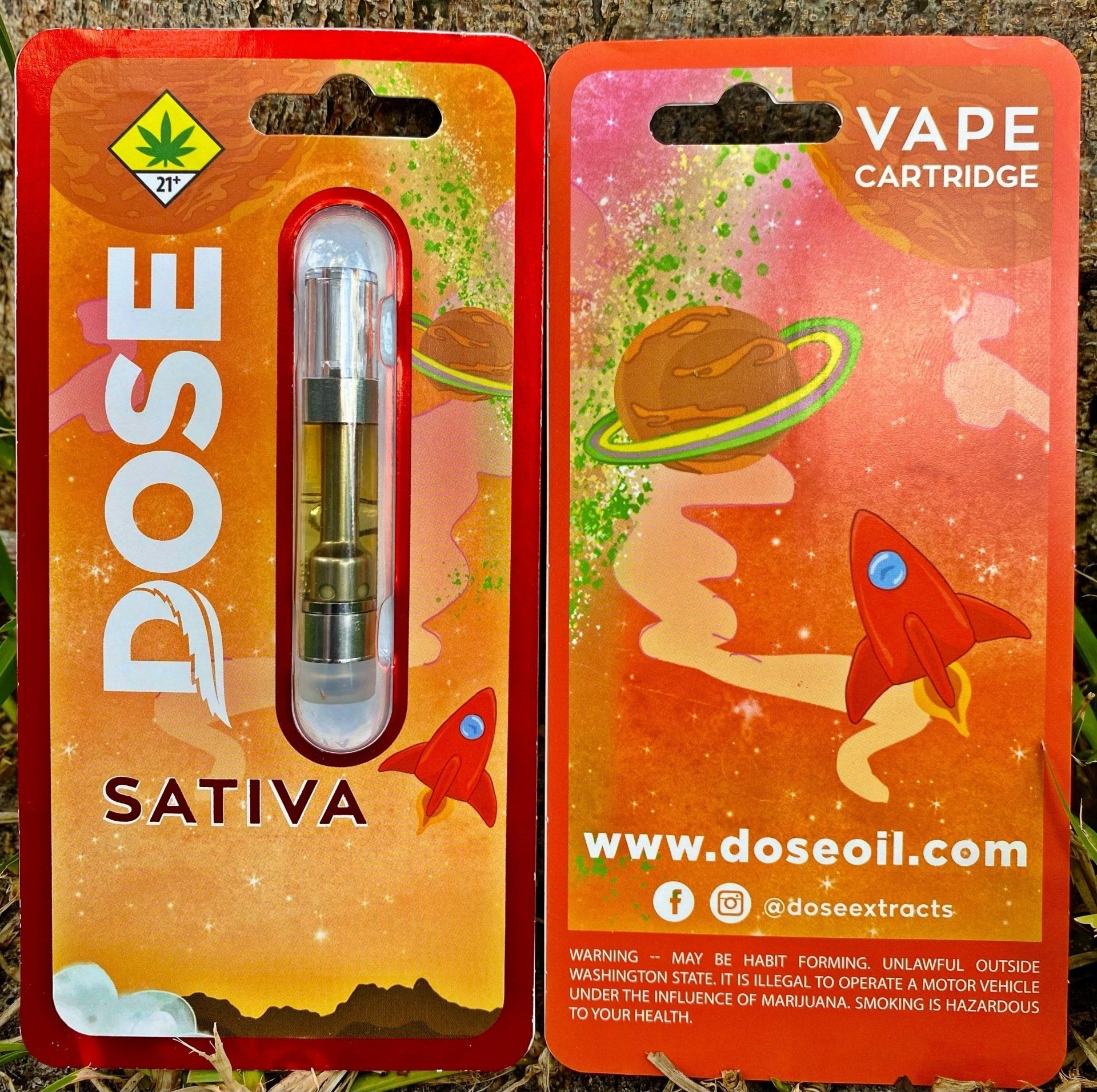 A dose sativa vape cartridge with a rocket on it