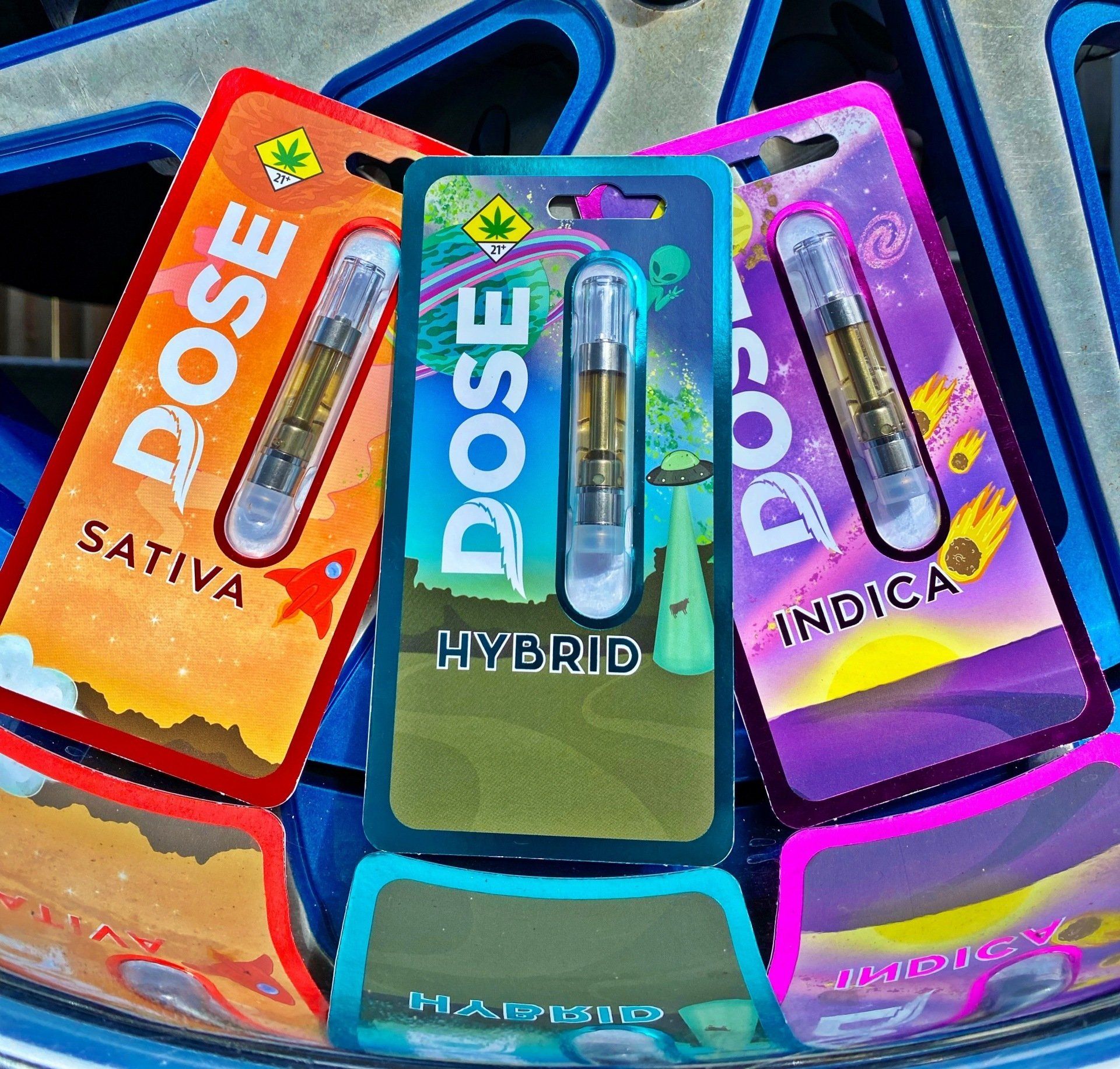 Three dose cartridges are sitting on top of each other
