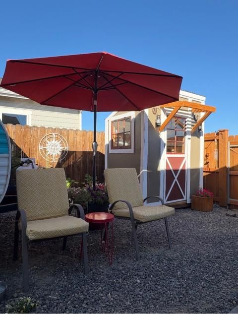 There is a pond in the middle of the yard.