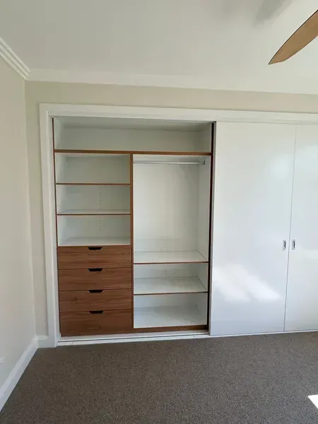 Built-in White and Wood-toned Closet With Sliding Doors  — JRB Joinery In Kew, NSW