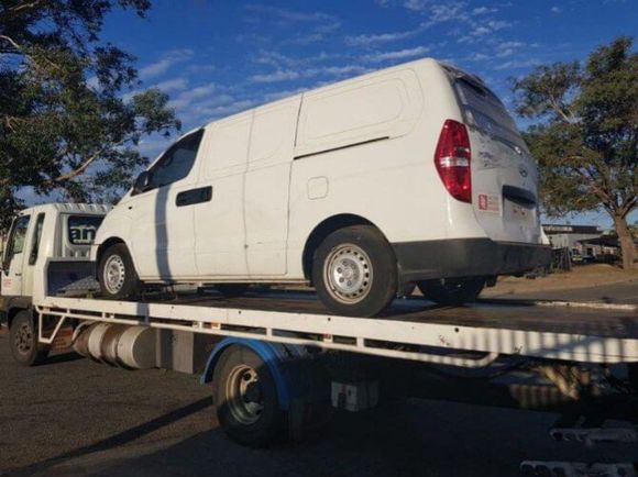 truck towing a car