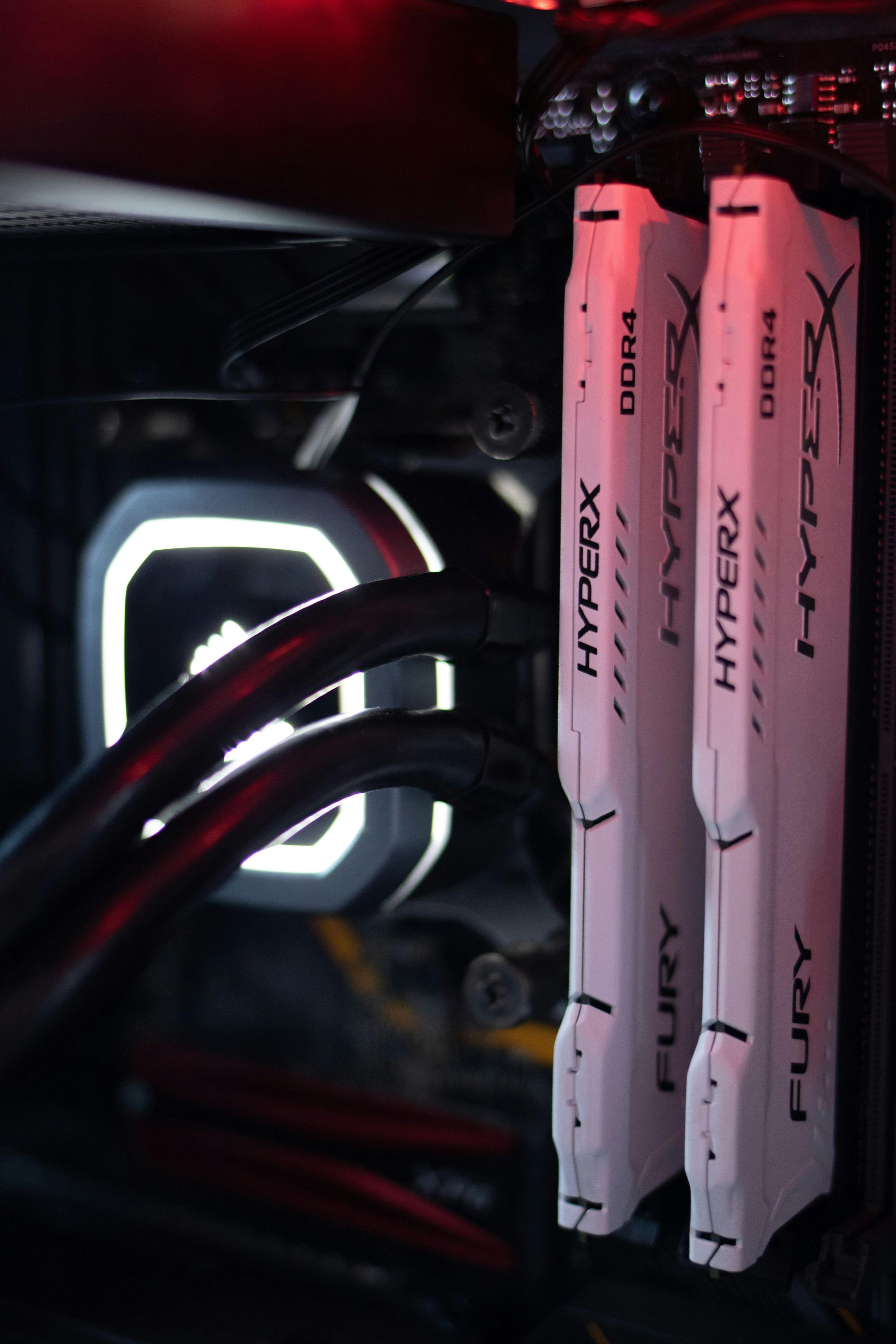 A close up of two hyperx ram sticks in a computer