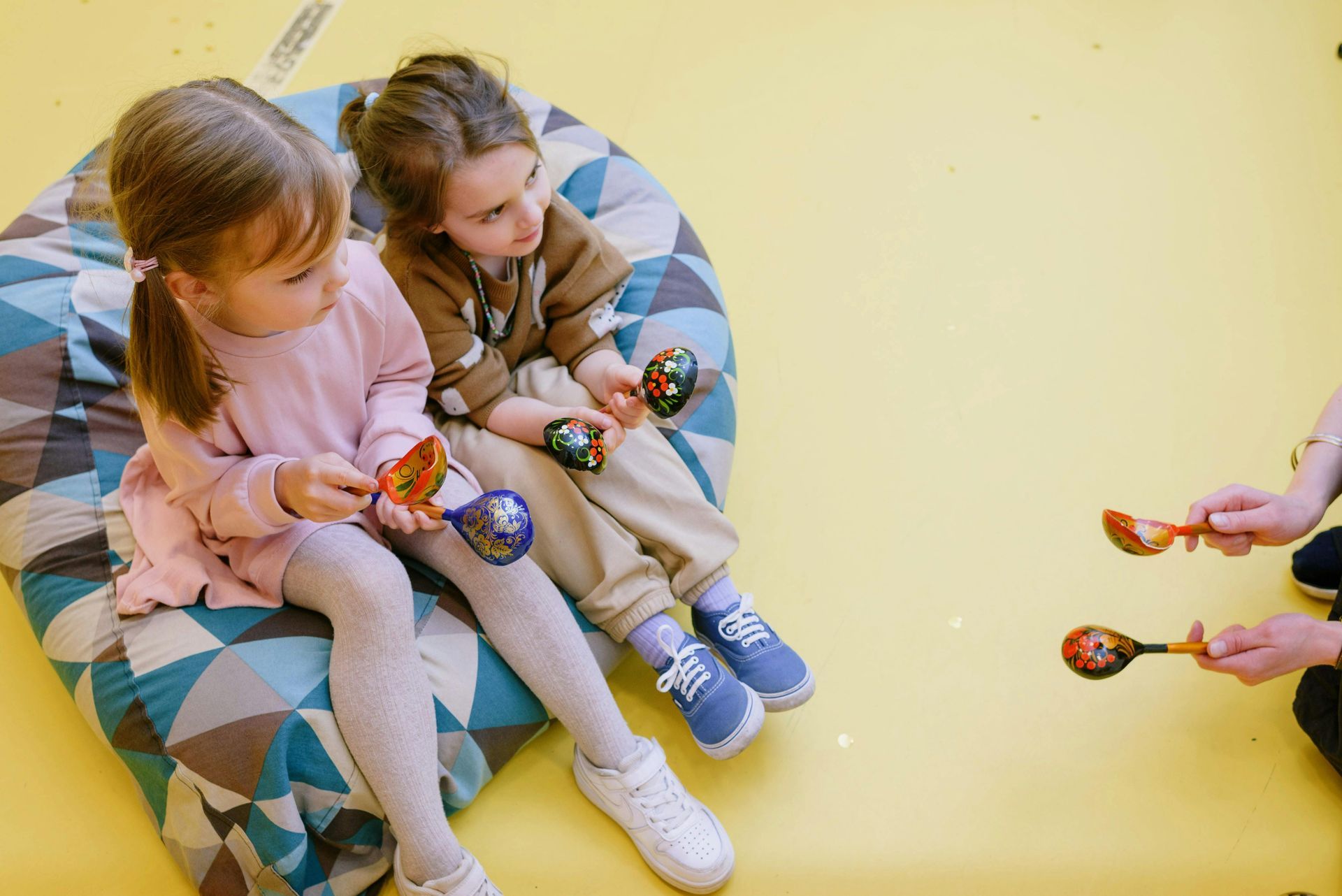 Children learning music and rhythm