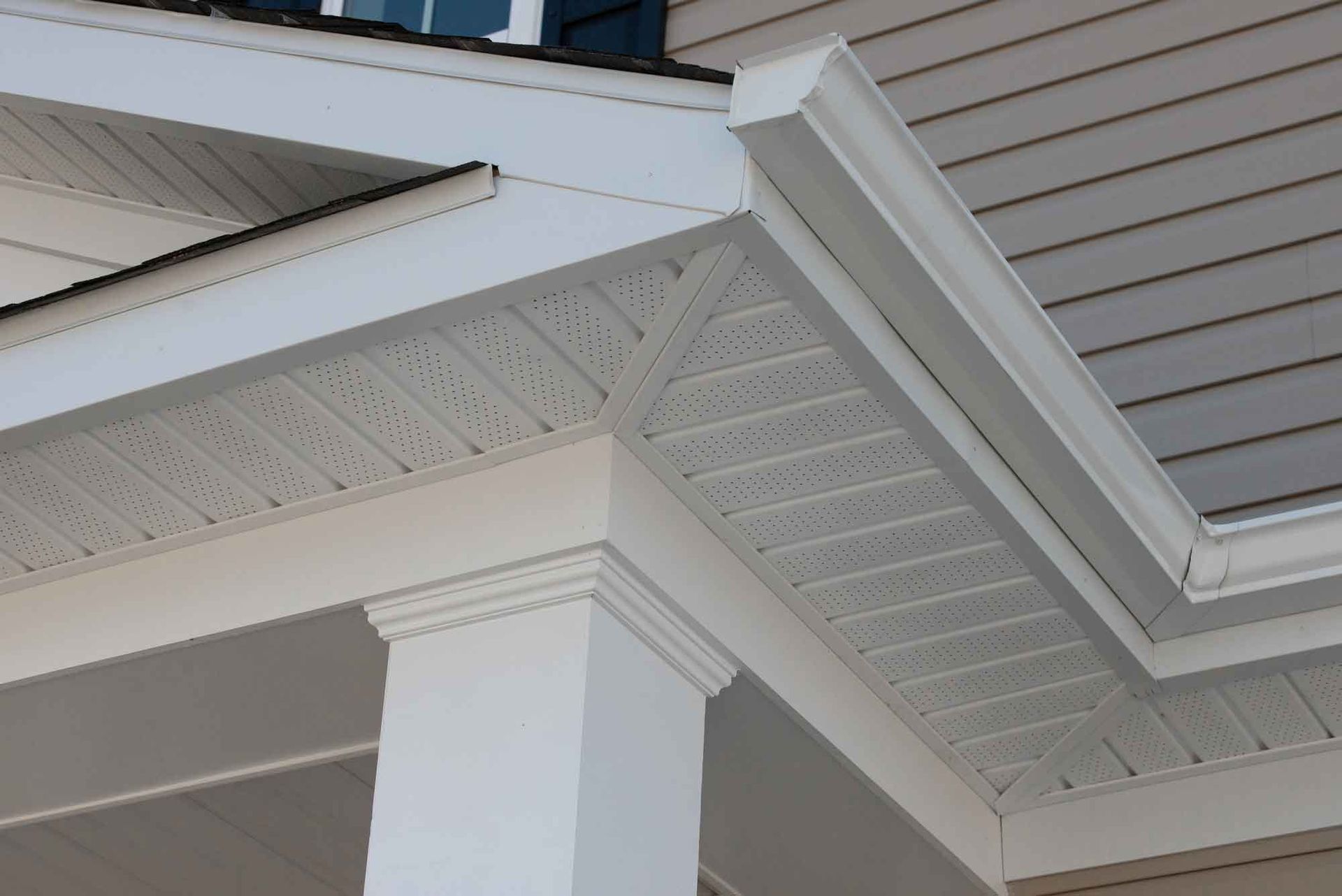 Skilled worker hands carefully arranging and securing roof tiles, creating a durable and precise roofing structure.