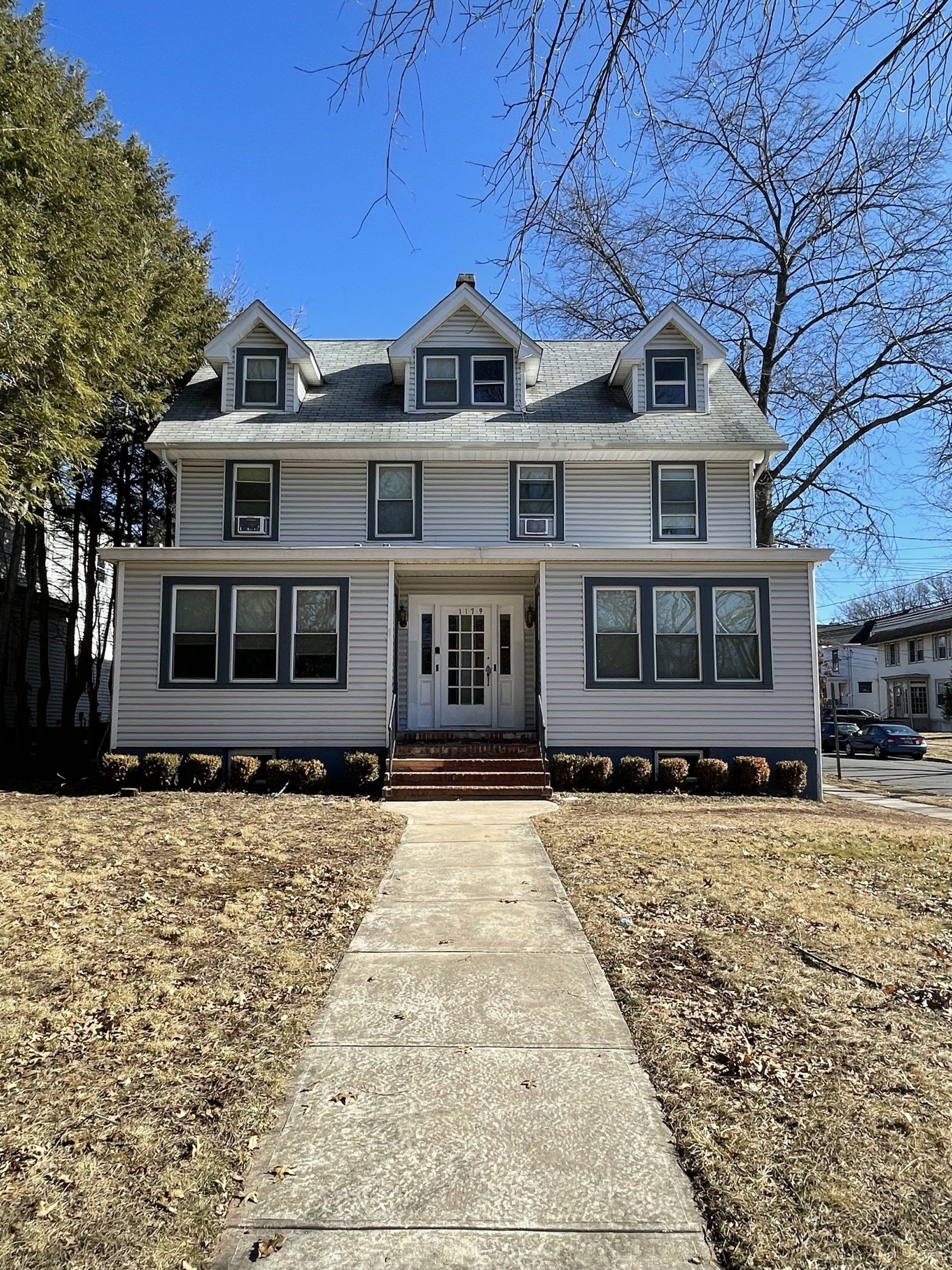 Exterior of 117-119 South 1st Ave, Highland Park, NJ - 6 Unit. Two-story building.
