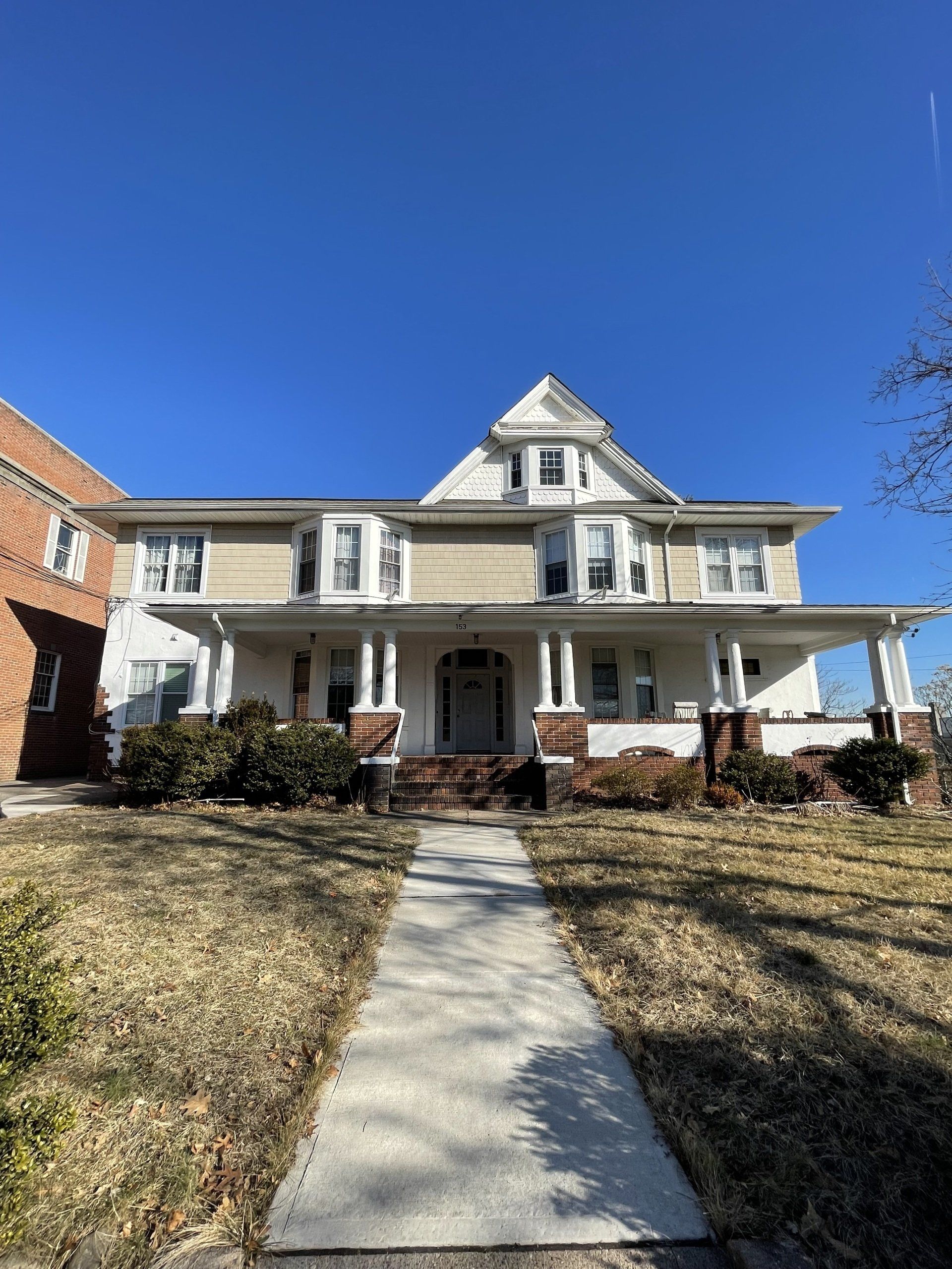 Exterior of 153 Dayton St, Ridgewood, NJ - 6 Unit. Two-story building.