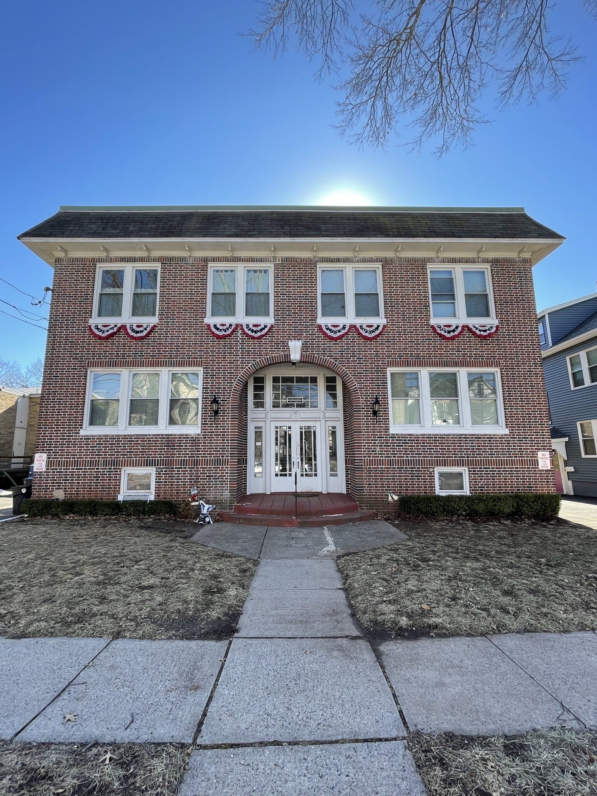 Exterior of 222 Denison St, Highland Park, NJ - 8 Unit. Brick two-story building.