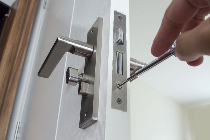 Fixing a Door Lock With Screwdriver