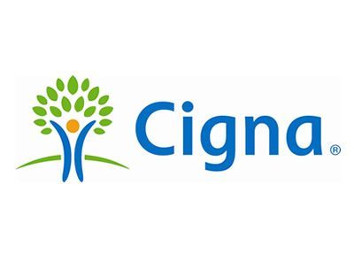 Cigna logo: Person with arms up under a tree with green leaves and the word Cigna in blue.