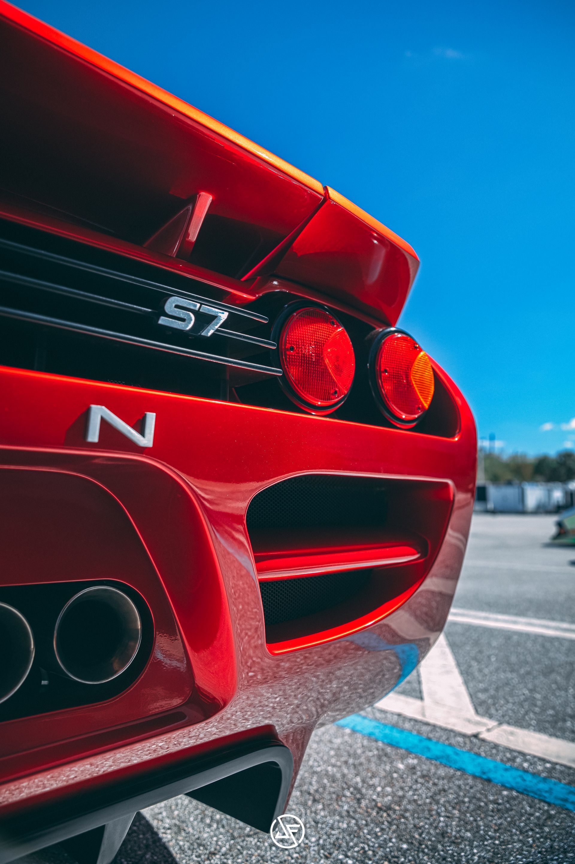 Red Noble S7 sports car rear with the 