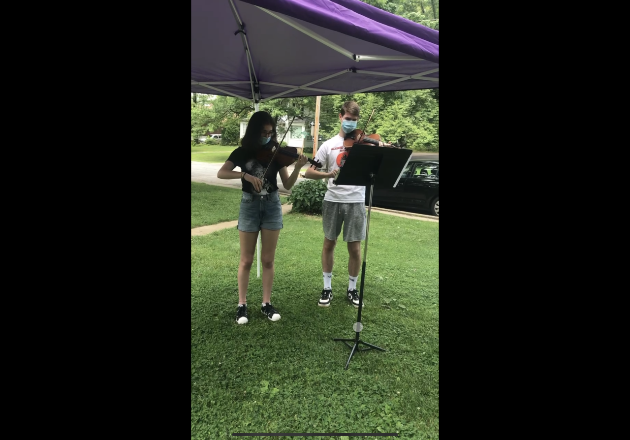 Violin duet in the yard
