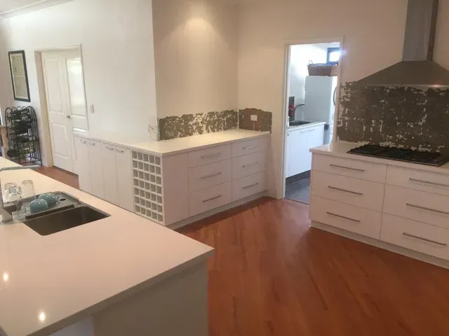 Kitchen With Hood In Progress — East Bunbury, WA — Bunbury Designer Cabinets & Furniture