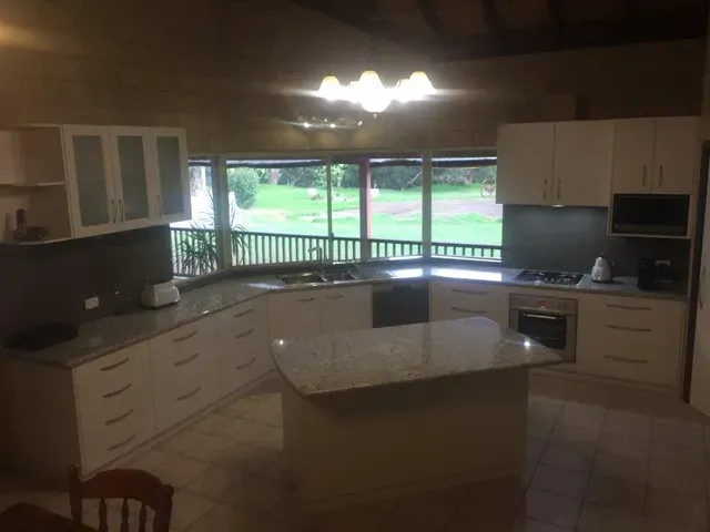 Kitchen With Countertop In The Middle — East Bunbury, WA — Bunbury Designer Cabinets & Furniture