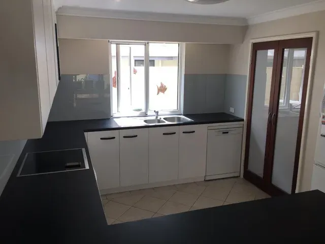 Black Countertop — East Bunbury, WA — Bunbury Designer Cabinets & Furniture