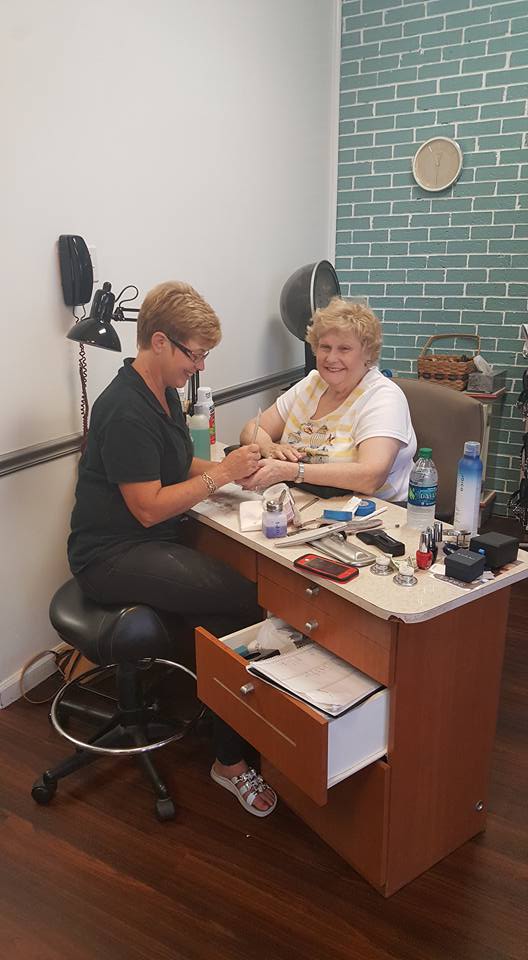 Manicure Services — Woman Having a Manicure in West Frankfort, IL