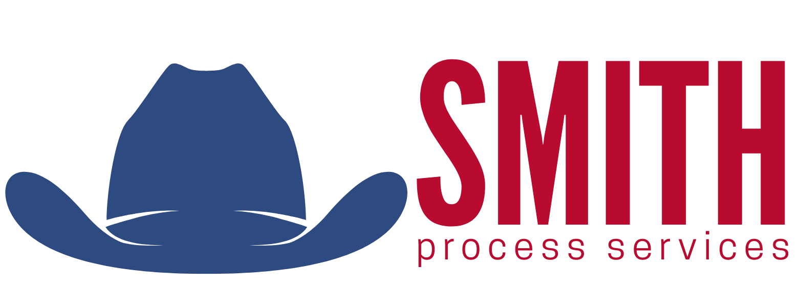 The logo for smith process services has a cowboy hat on it.