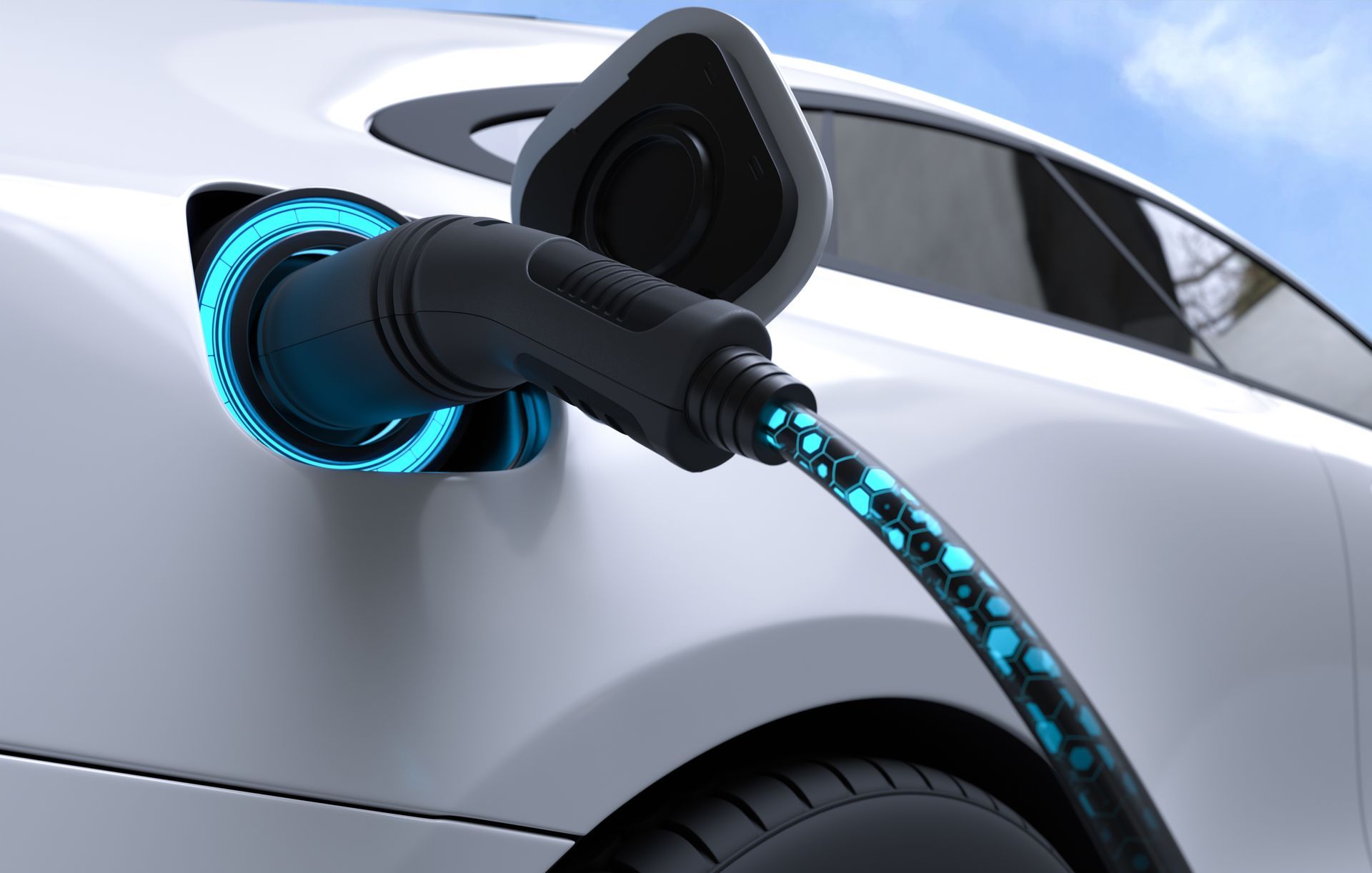 White electric car being charged with a blue glowing cord.