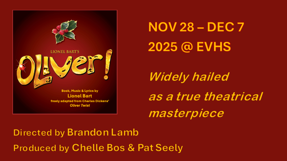 Two men in suits and hats are dancing on a stage