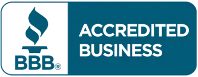 A blue sign that says accredited business on it