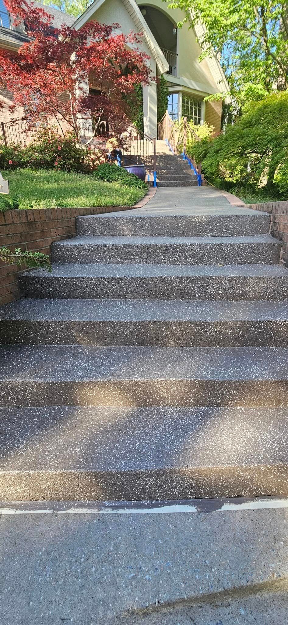 A set of stairs leading up to a house.